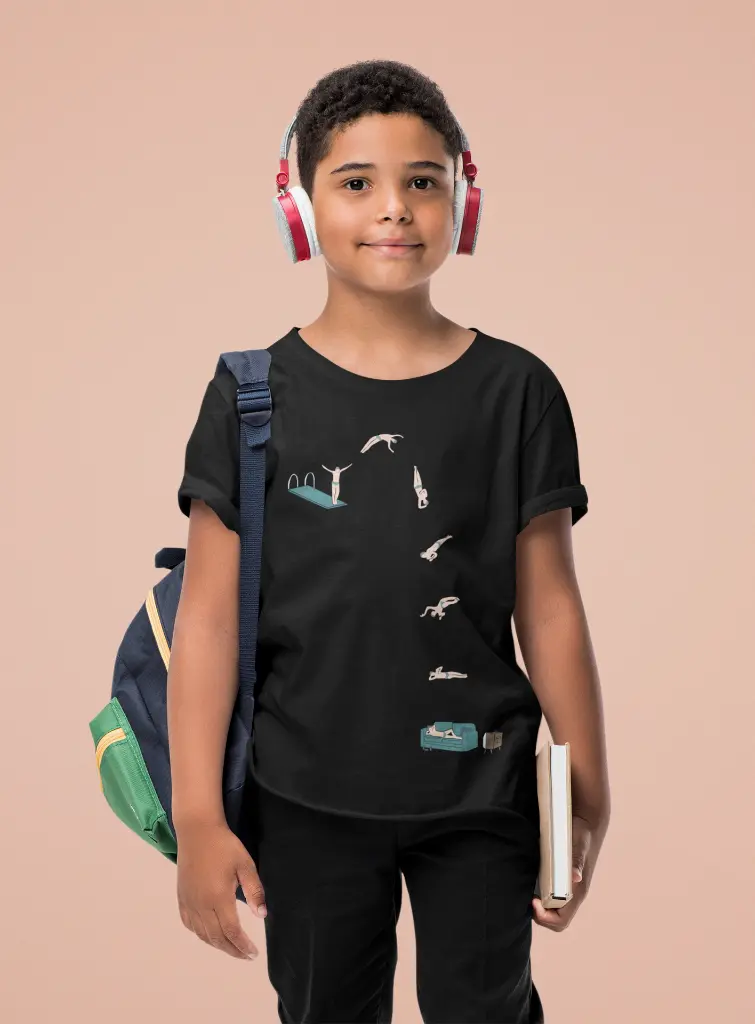 t-shirt-mockup-of-a-kid-with-school-articles-standing-at-a-studio-44445-r-el2.webp