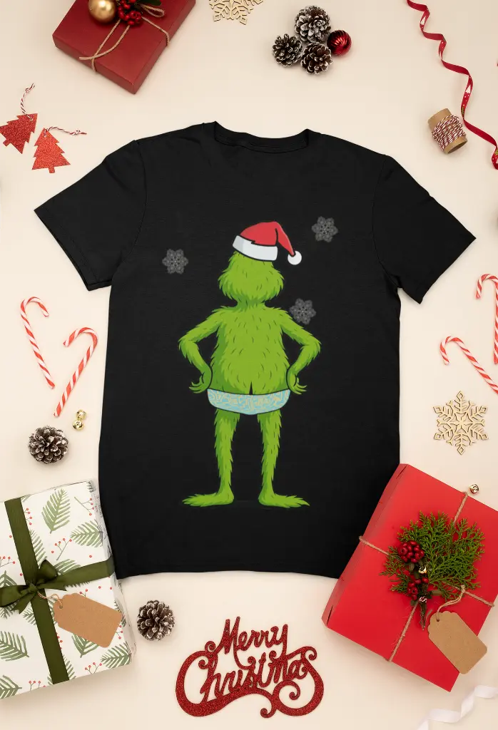 mockup-of-a-t-shirt-surrounded-by-christmas-presents-and-decorations-30632.webp